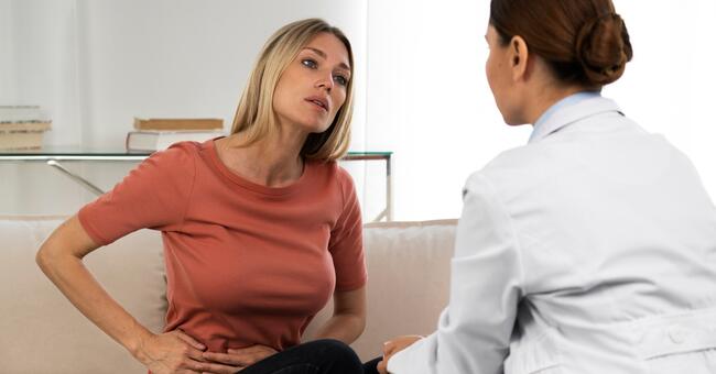 side-view-doctor-talking-woman