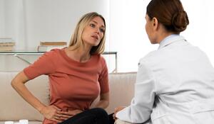 side-view-doctor-talking-woman